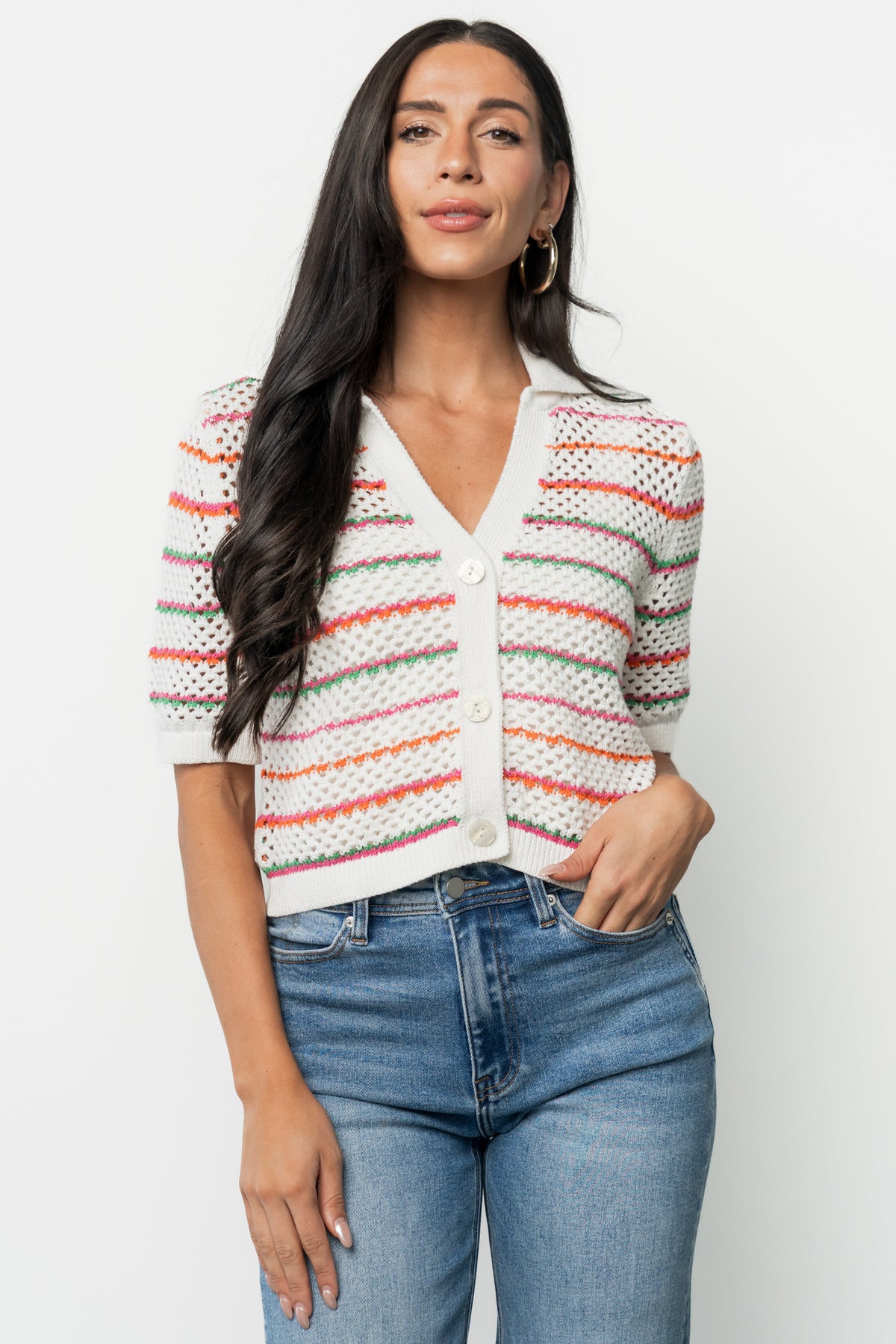 Front view of Viento Multistripe crochet cropped cardigan on model showing deep V-neck, lapel collar, three buttons and relaxed, slightly cropped silhouette.