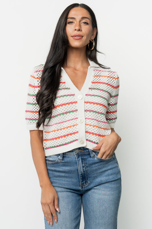 Front view of Viento Multistripe crochet cropped cardigan on model showing deep V-neck, lapel collar, three buttons and relaxed, slightly cropped silhouette.