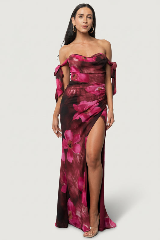 Front view of Allegra off-shoulder maxi in Berry Rouge Floral on model; shows cowl neckline, bow straps, and tulip skirt.