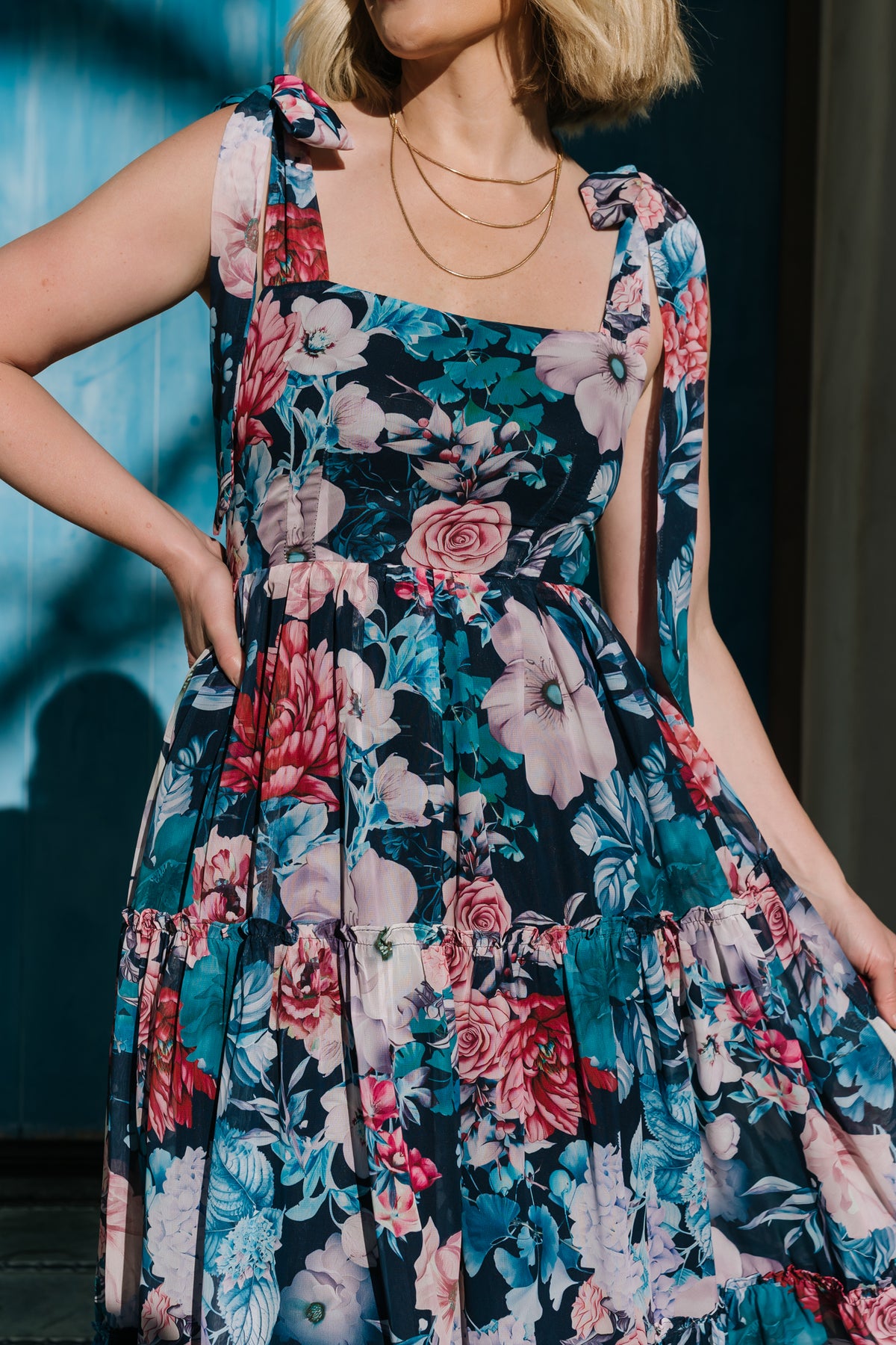 Studio shot of Anita Maxi Dress laid flat to show construction: square neckline, paneled bodice, smocked back, and full lining.