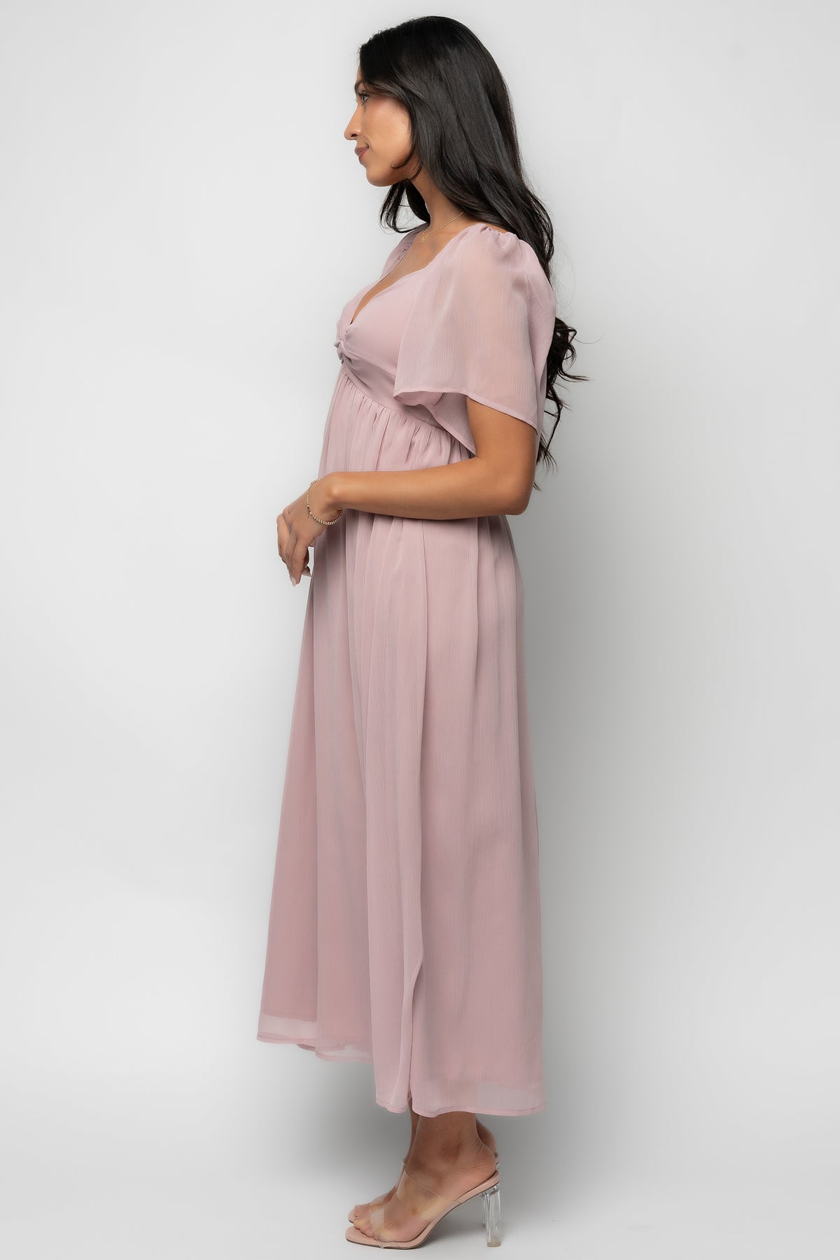 Close-up of knotted bust and horizontal seaming on the Nora Midi Dress in dusty mauve, highlighting fabric texture and construction.