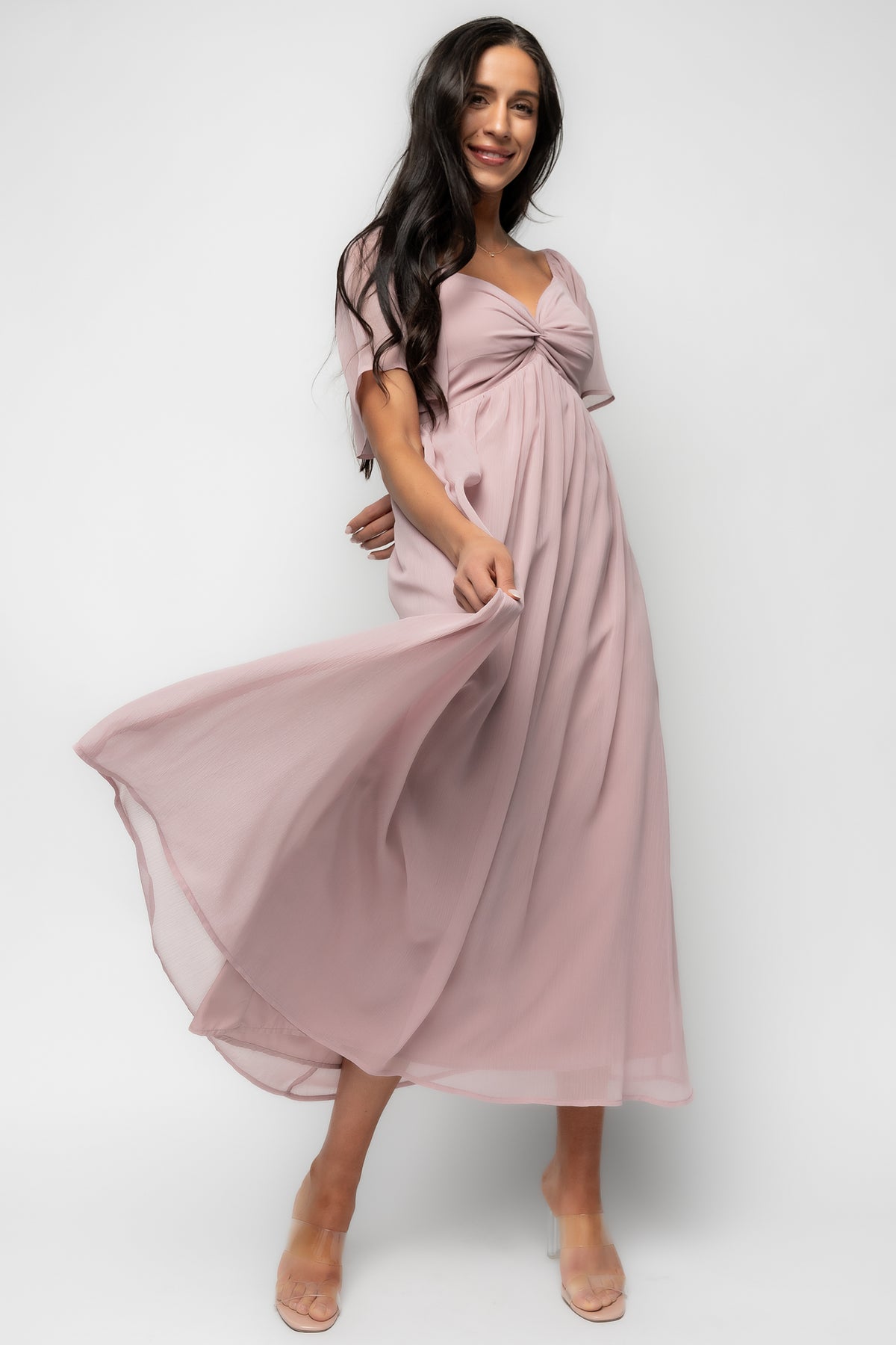Styled flat-lay or model detail of Nora Midi Dress in dusty mauve, emphasizing fully lined bodice and skirt for smooth coverage.