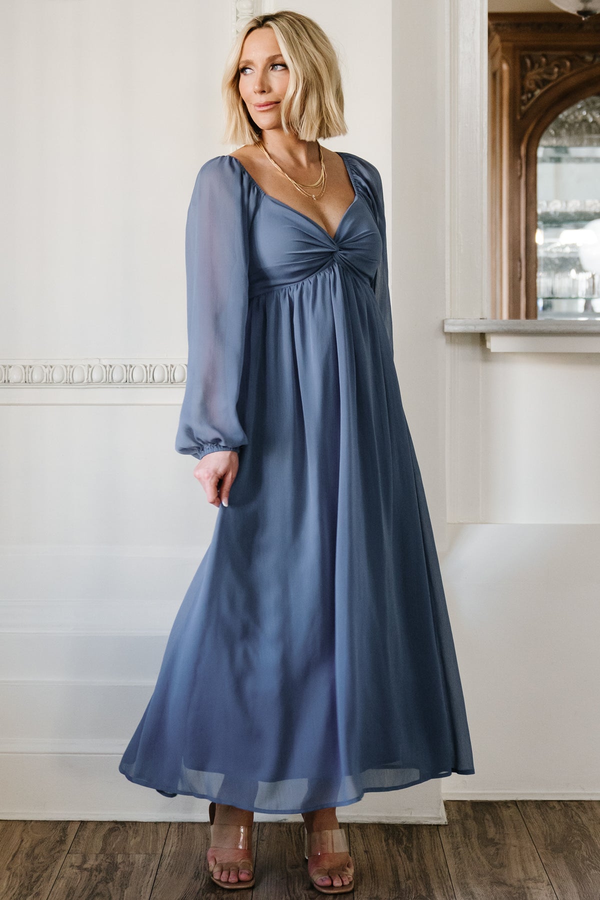 Close-up of knotted bust and horizontal seaming on the Dione dress, highlighting fabric texture and sweetheart neckline.
