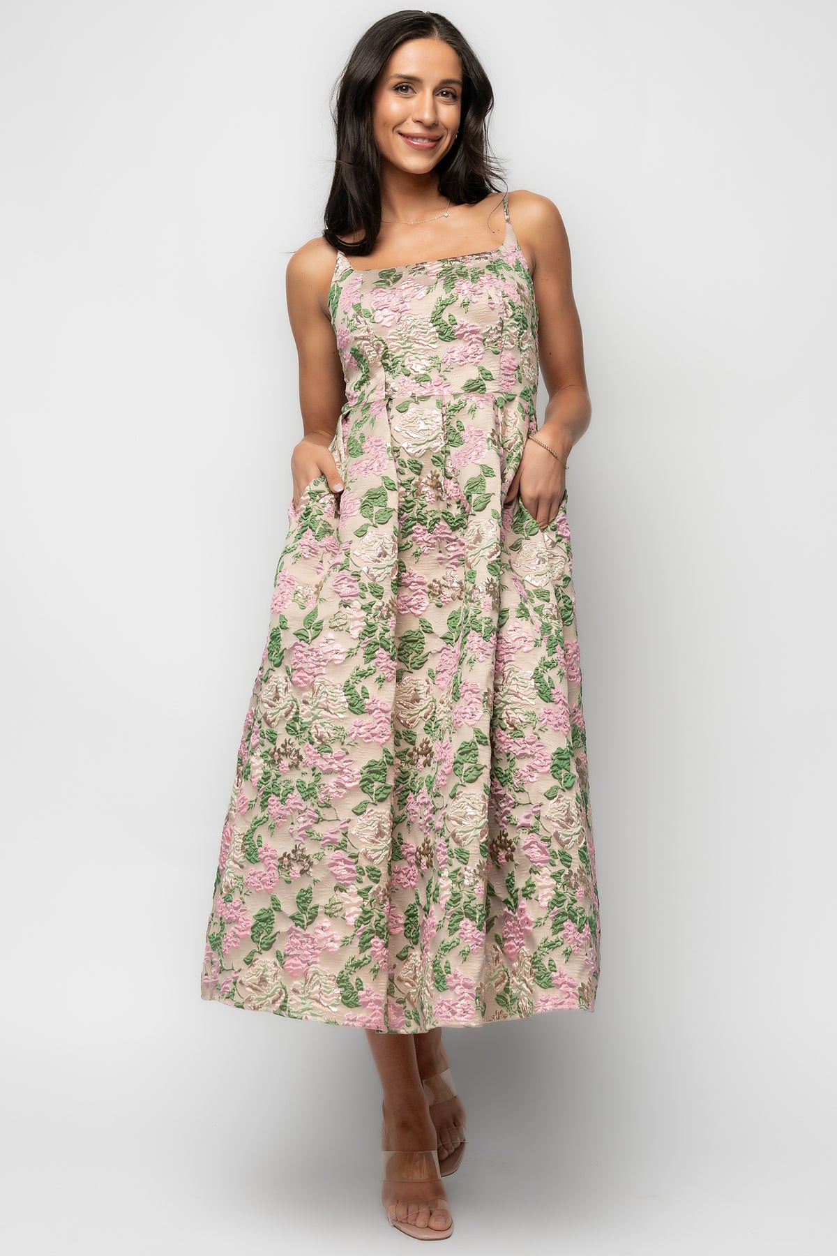Front view of the Antoinette Embossed Midi Dress in champagne multi floral jacquard on model, full midi length and A-line skirt (photographed on model).