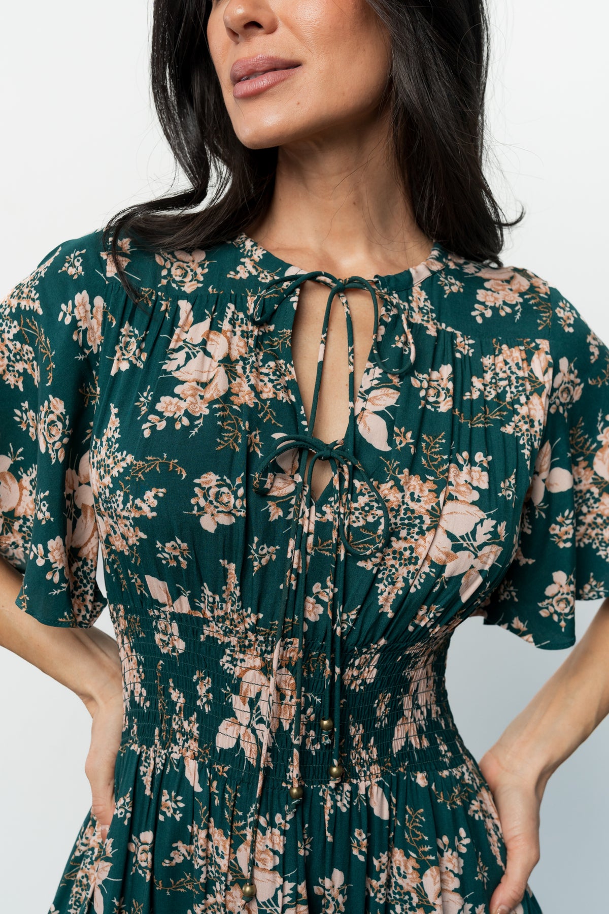 Back view of the Topaz Spell Boho Midi Dress showing seam lines, finished hem and how the lining sits at mid-thigh for coverage.