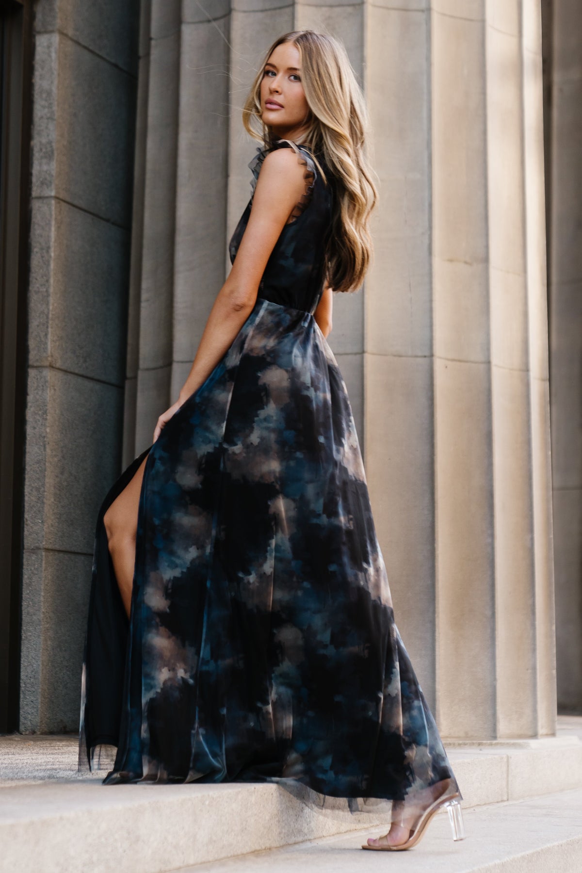 Close-up of Adelyn dress bodice in Midnight Floral showing deep V, flutter sleeve detail, and soft tulle overlay texture.