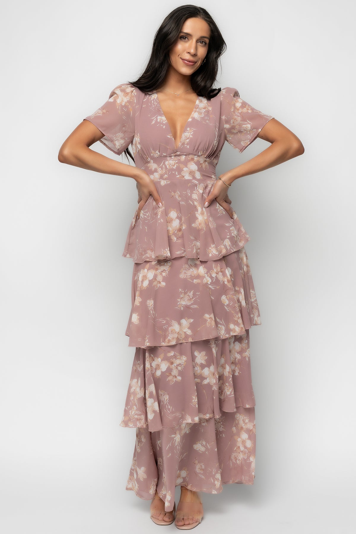 Full-length side profile of Mauve Floral Montaigne Maxi showing cascading asymmetrical ruffles and soft chiffon movement on model.