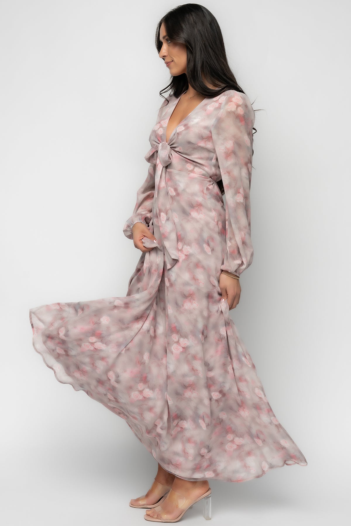 Back view: Ensley Maxi Dress in Dusty Rose Floral highlighting elastic back waist and smooth lined skirt.