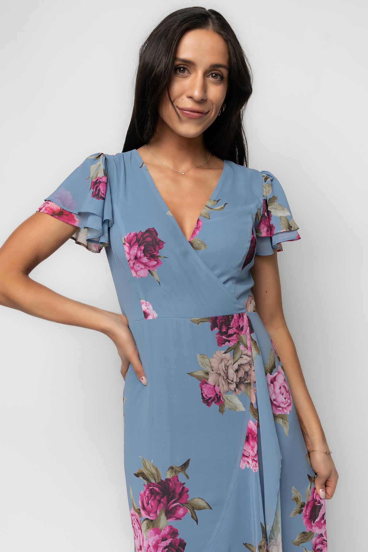 Close-up of the floral print and chiffon texture on the Willa Maxi Dress, emphasizing color tones and soft draping details.
