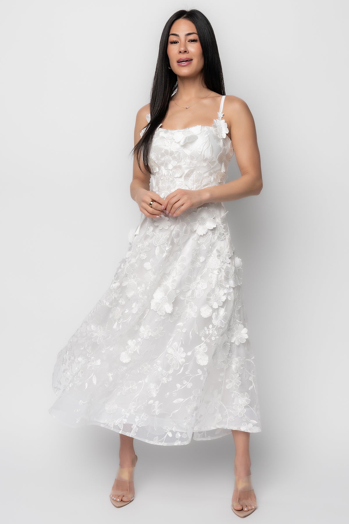 Full-length shot of Soleil floral applique midi dress on mannequin showing silhouette and midi length.