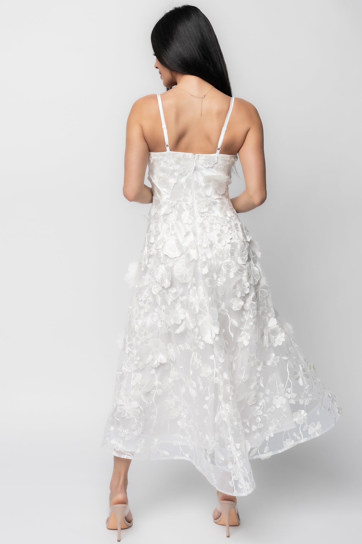 Back view of the Soleil dress showing discreet center back zipper and smooth fully lined interior.