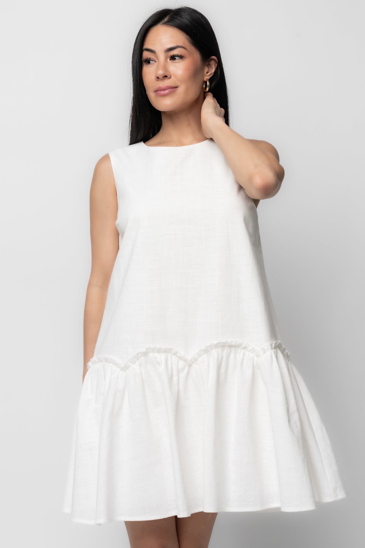 Styled look: Paulina Short Dress in off-white paired with simple sandals, highlighting relaxed shift fit and scalloped ruffle tier for daytime events.