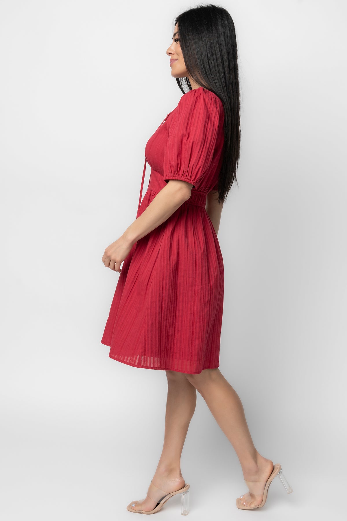 Close-up of Hayley Short Dress bust detail in dusty red, showing functional tie at the bust and V-neckline finish.