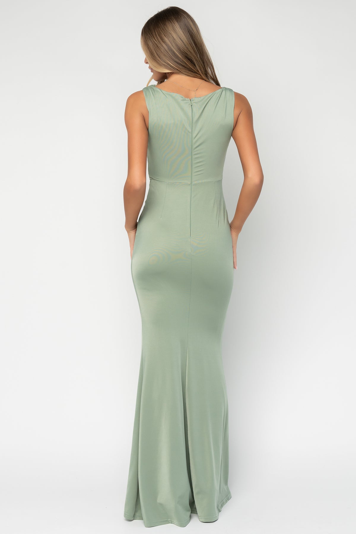Close-up of the gold-tone oval hardware and ruched waist detail on the Avalon Maxi Dress, highlighting metal finish and fabric texture.