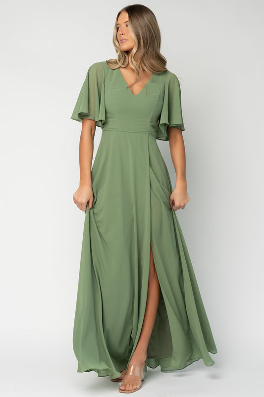 Front view of model in olive Valetta chiffon maxi dress with V-neck, flutter sleeves and flowing skirt, styled for formal occasions.