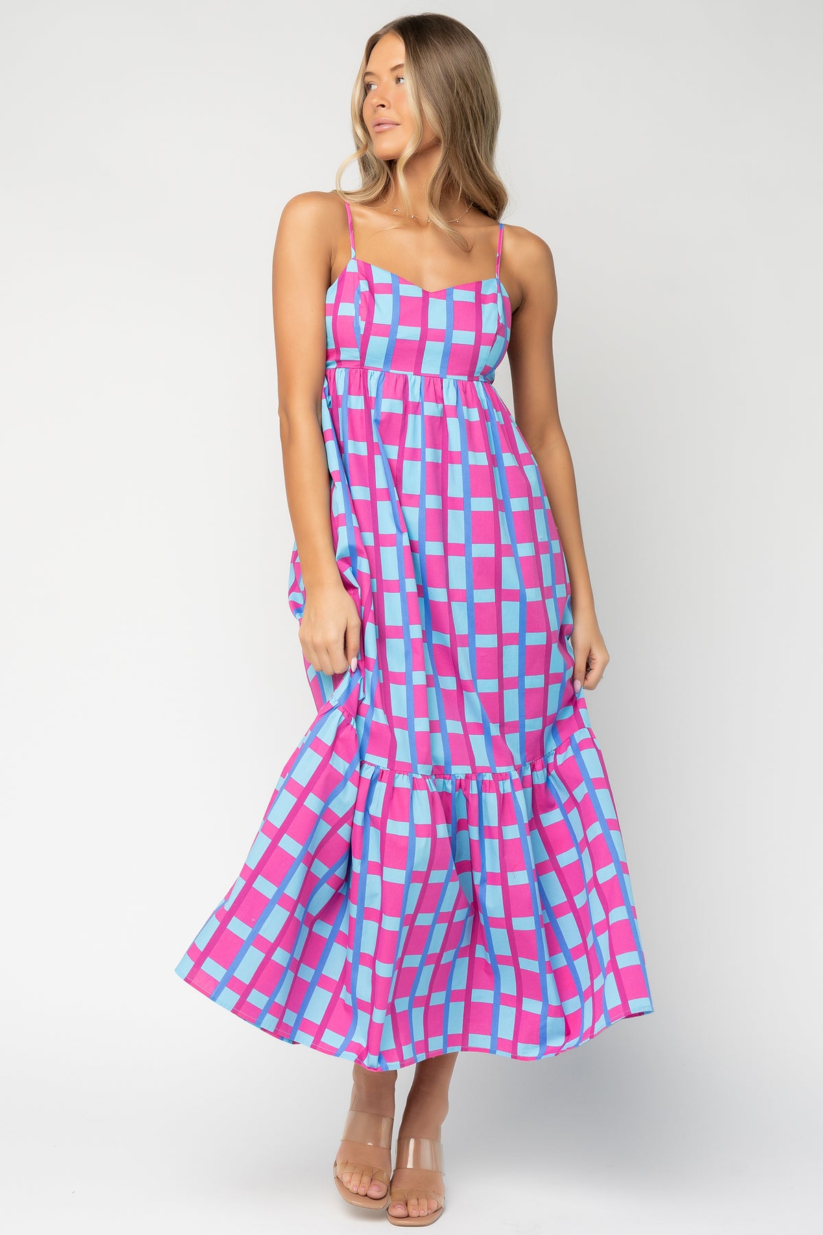 Front view of Rita Maxi Dress in pink-and-blue geometric check; V-neck, adjustable straps, empire waist and side pockets.
