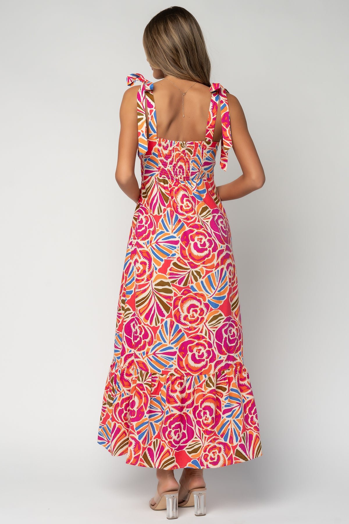 Detail shot of adjustable shoulder tie and straight neckline on the Sydney Maxi Dress in multi floral print, with visible lining edge.