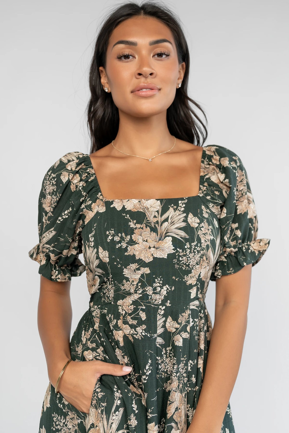 Addison Maxi Dress in Green + Natural with a square neckline, puffed ruffle-cuff sleeves, and a tiered ruffle skirt.
