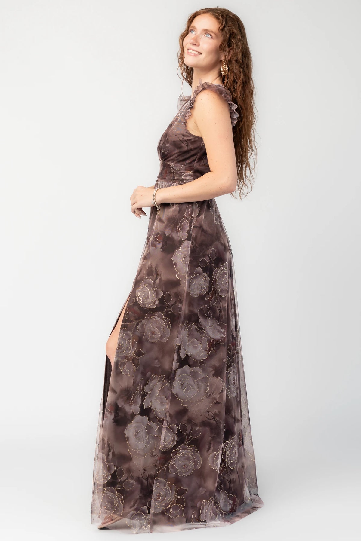 Adelyn Maxi Dress in Deep Clove Metallic with deep V-neck, flutter sleeves, banded waist, tulle overlay, and leg slit.