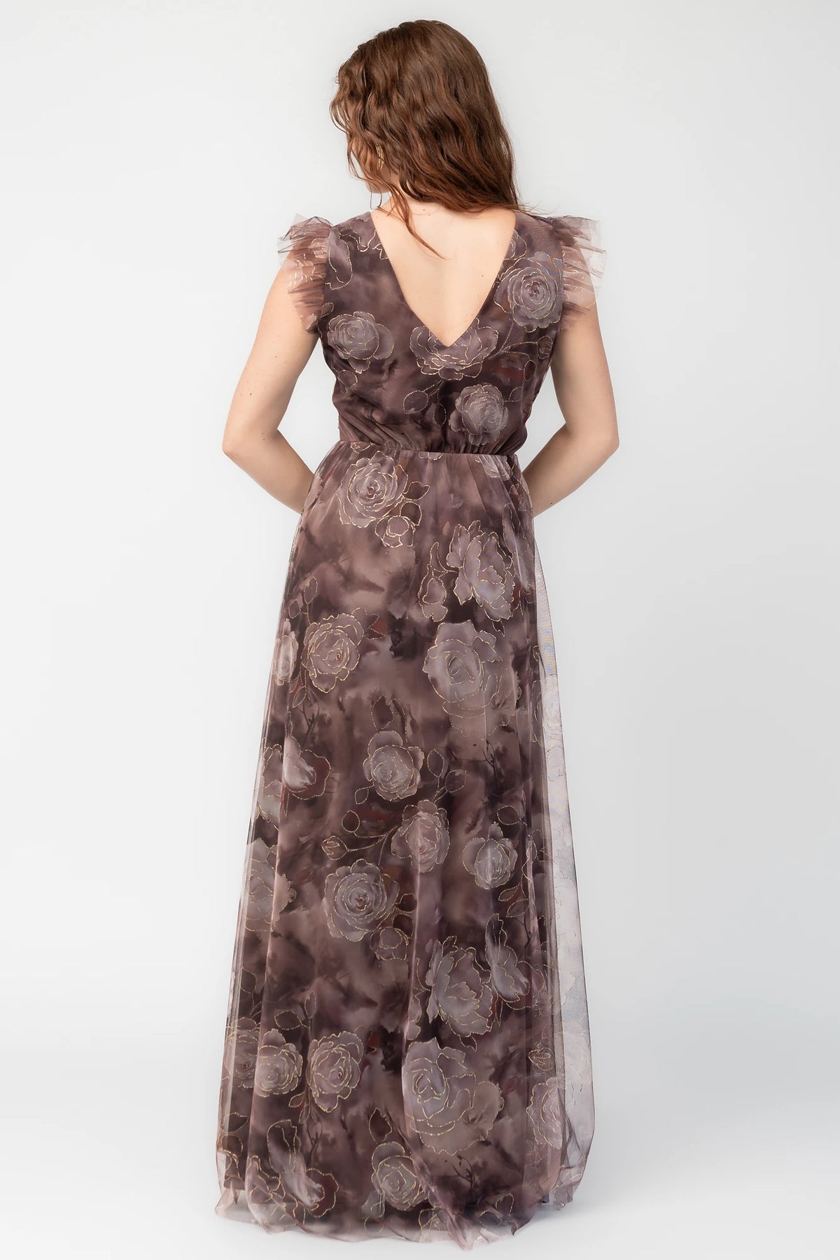 Adelyn Maxi Dress in Deep Clove Metallic with deep V-neck, flutter sleeves, banded waist, tulle overlay, and leg slit.