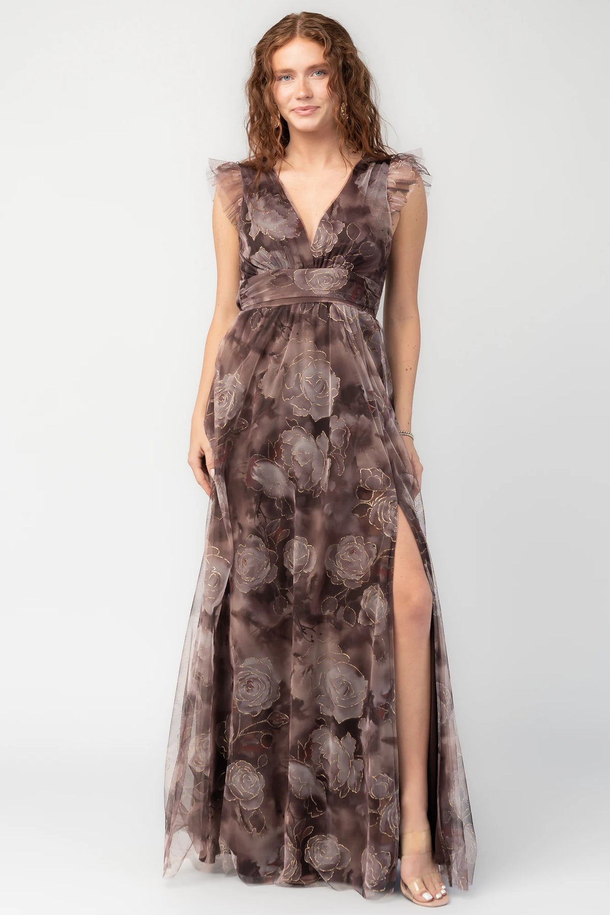 Adelyn Maxi Dress in Deep Clove Metallic with deep V-neck, flutter sleeves, banded waist, tulle overlay, and leg slit.
