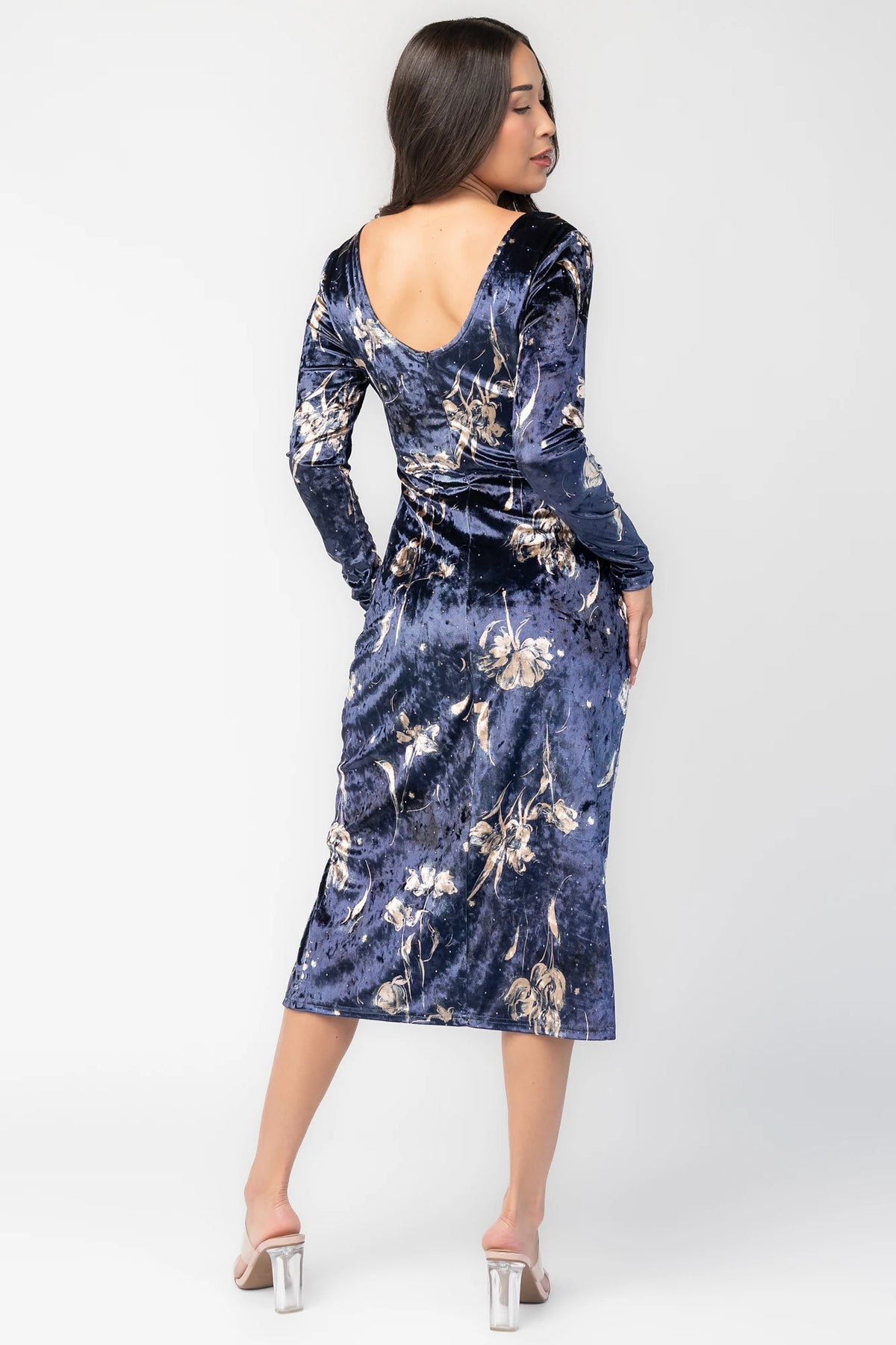 Afterglow Velvet Midi Dress in Navy + Gold with metallic florals, boat neckline, long sleeves, and side draping.