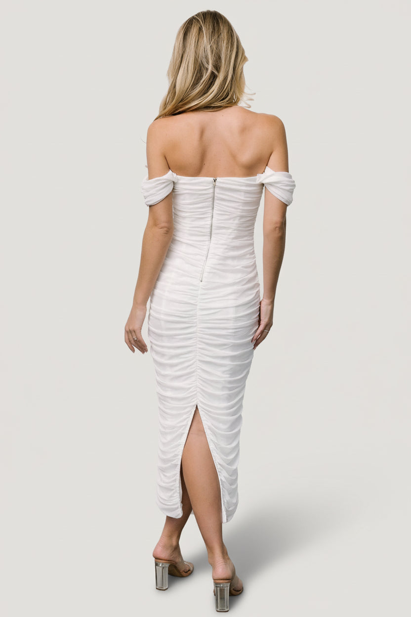 Styled look of Alessandra off-white mesh midi dress paired with minimal accessories, showing overall silhouette, midi length and ruched detail.