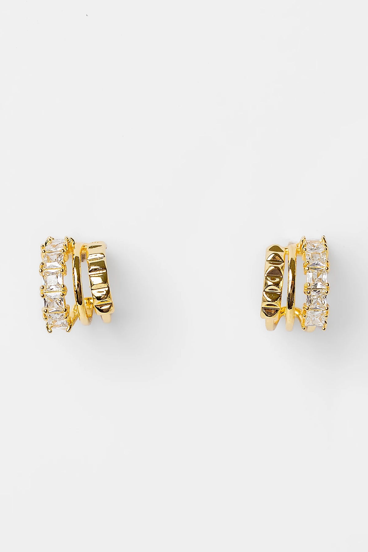 Ali Stacked Huggie Hoops in Gold with stacked design and cubic zirconia accents.