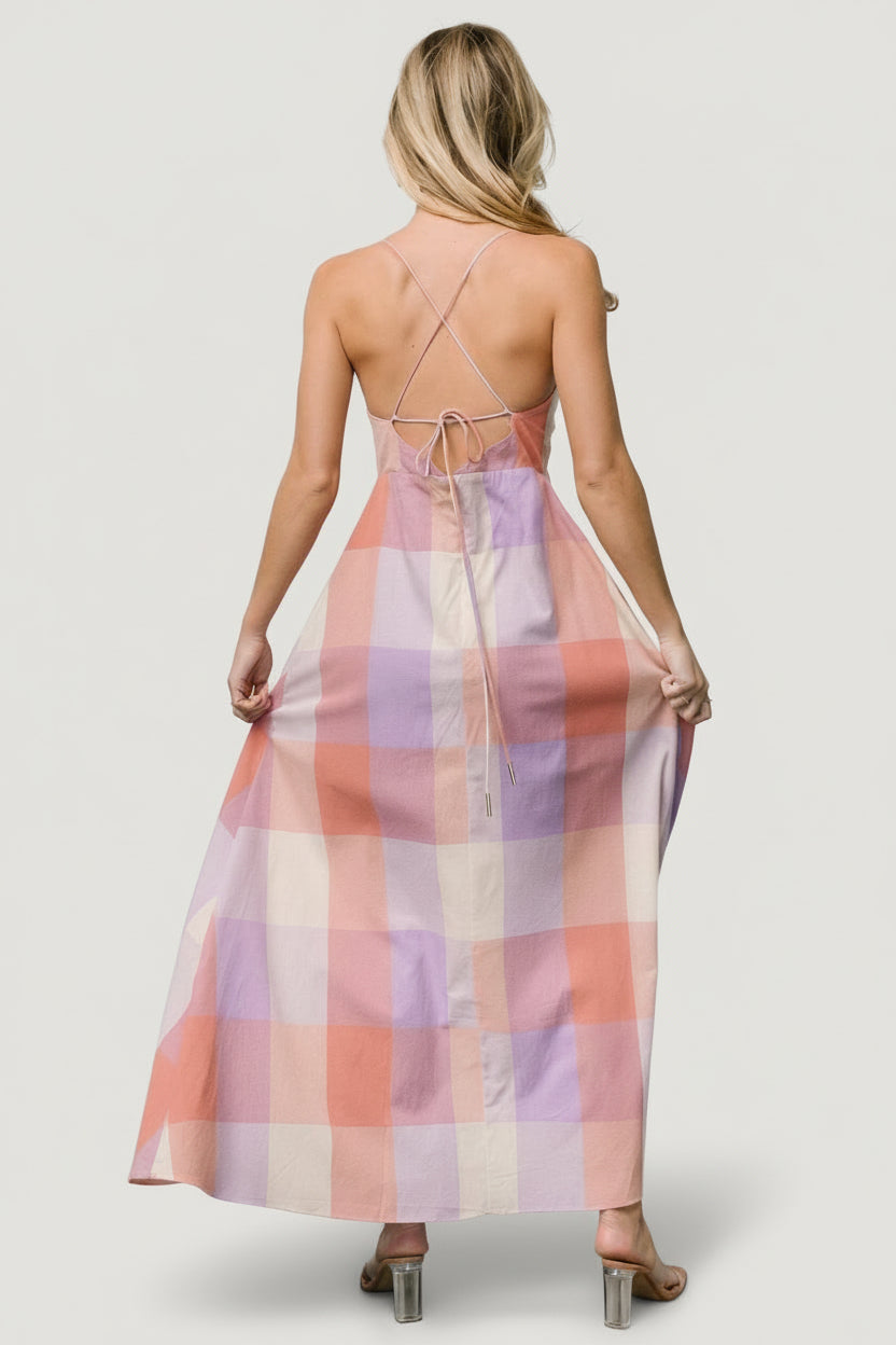 Back view of Ally Maxi Dress highlighting adjustable crossed straps and clean back silhouette in lavender coral print.