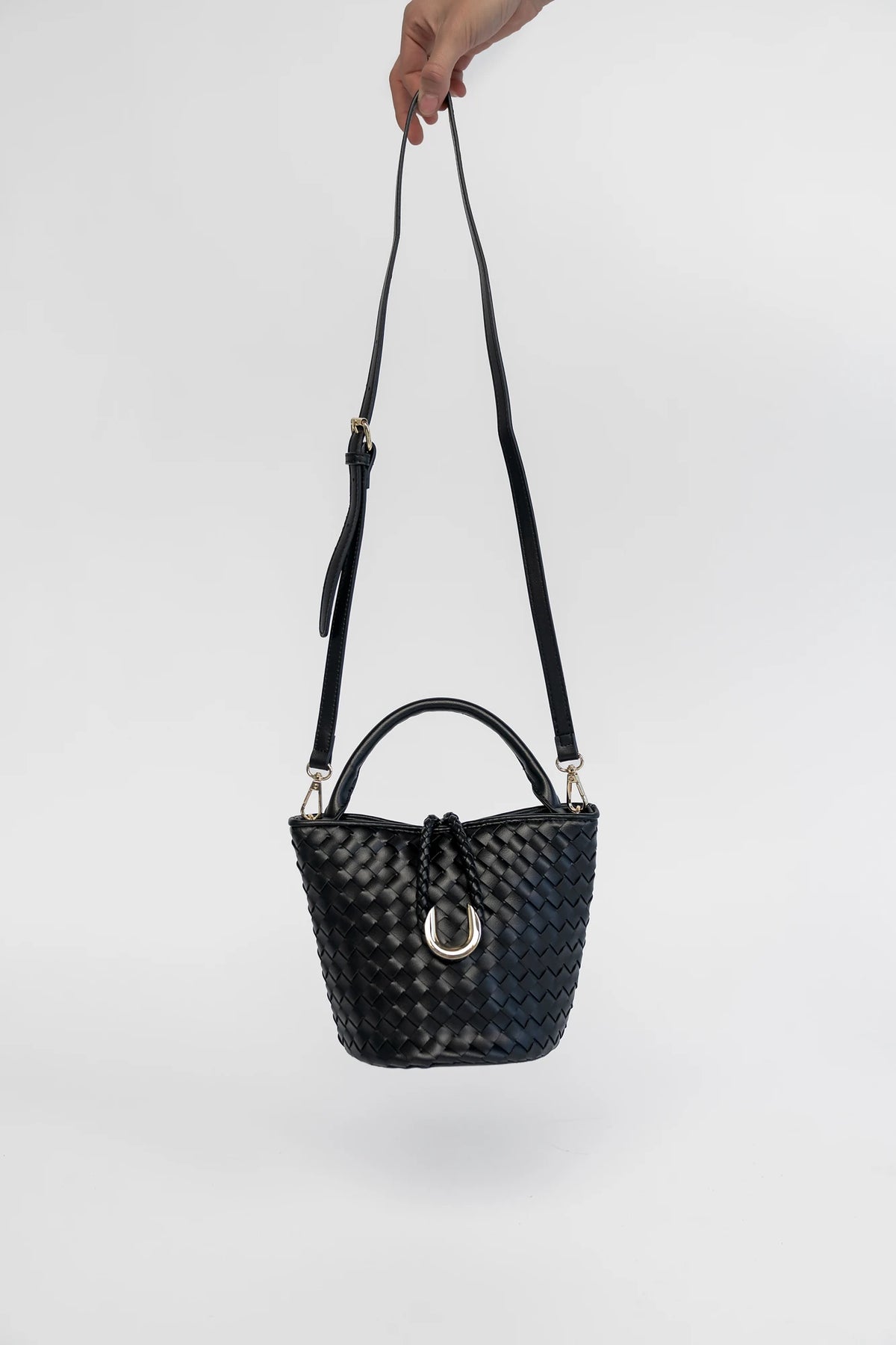 Annette Woven Tote Bag in Black with an allover woven design, structured top handles, and a gold-tone accent.
