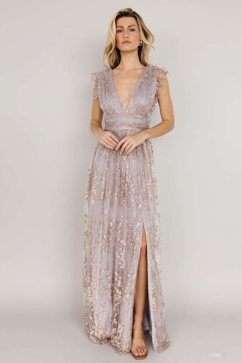 Detail shot of rose-gold floral sparkle on lilac shimmer tulle, highlighting sequin texture and shimmer finish.