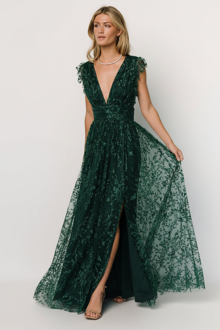 Model shot of emerald Arlene Shimmer Gown on a full-body mannequin displaying fit, shimmer tulle overlay, and high-waisted silhouette with leg slit.