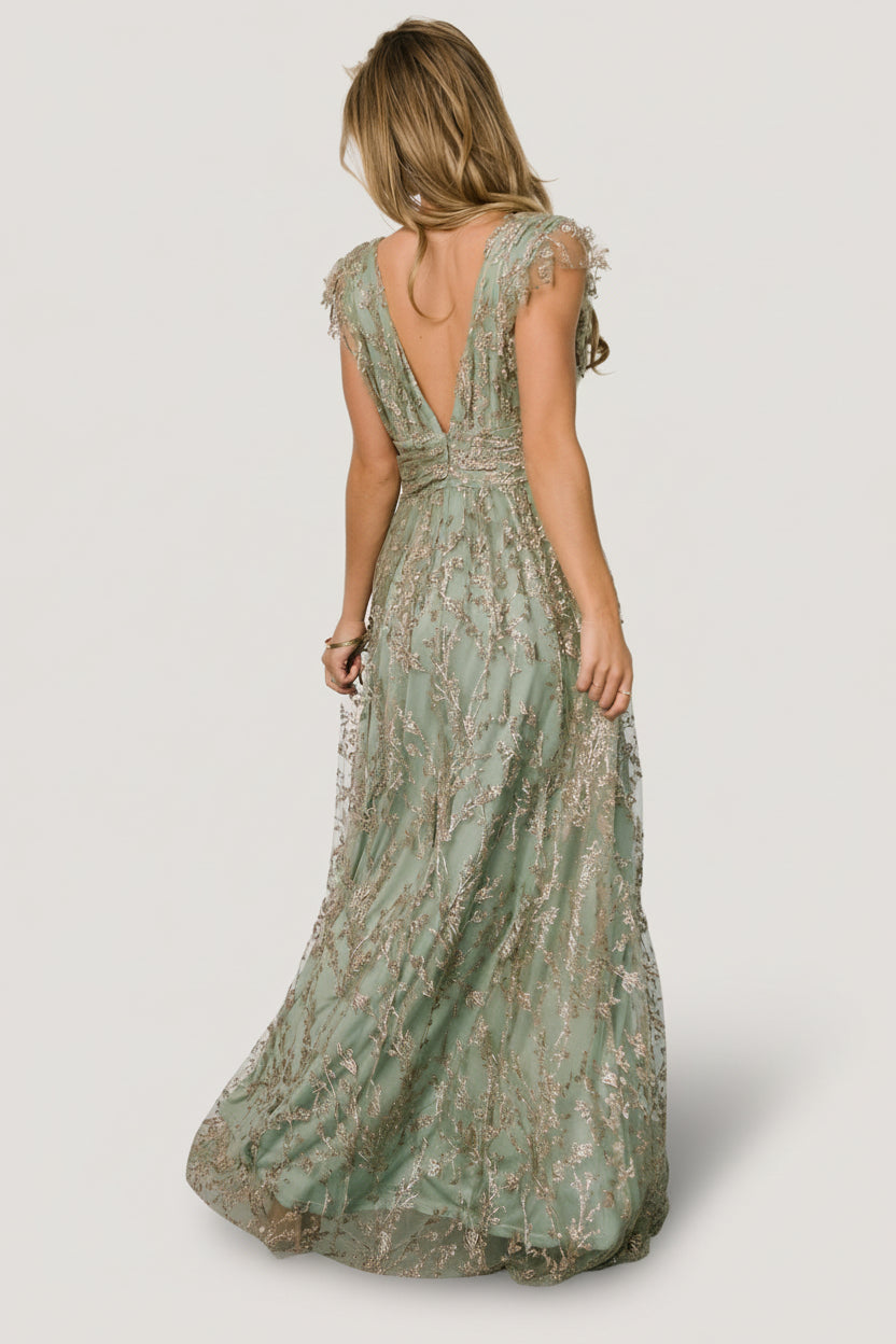 Detail of adorable tulle frill accents at the sleeve and upper bodice of the Arlene Shimmer Gown, with glittering sequin pattern.