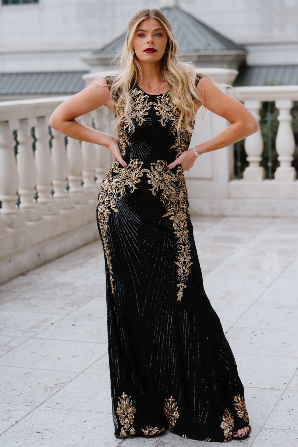 Close-up of Azura gown bodice with gold and black sequin detailing along the sides and curves, showing texture and shine.