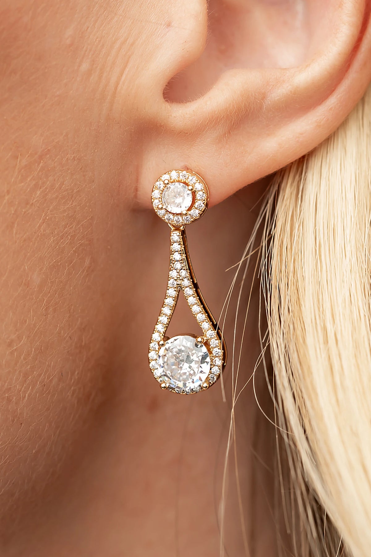 Balini Pave Drop Earrings in Gold with round clear stones, pavé detailing, and elegant teardrop drops.