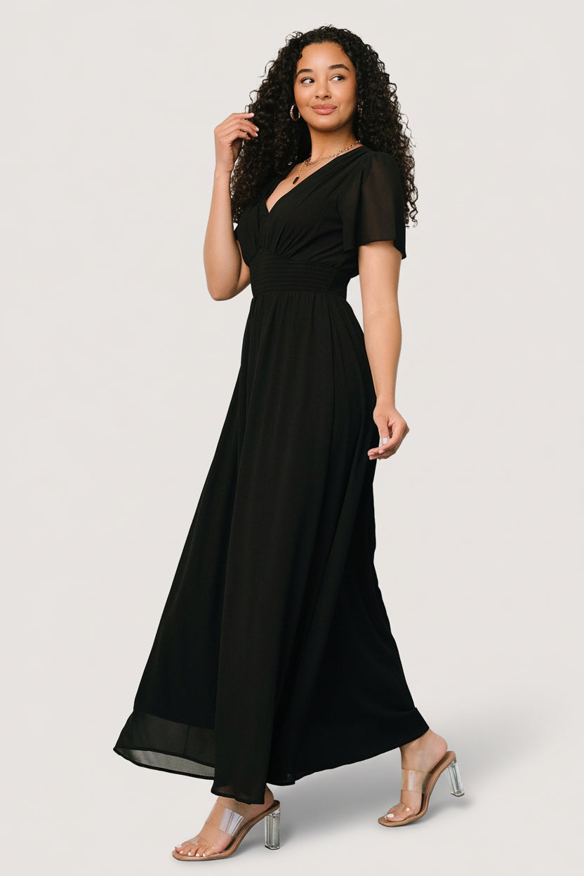 Detail image of the Birdie Maxi Dress fabric in black, showing chiffon texture and the dress’s delicate flutter sleeve edge.
