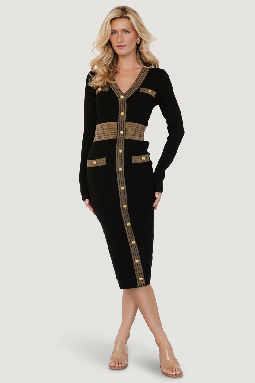 Three-quarter view showing four decorative front pockets with button hardware and the dress's tailored fit.