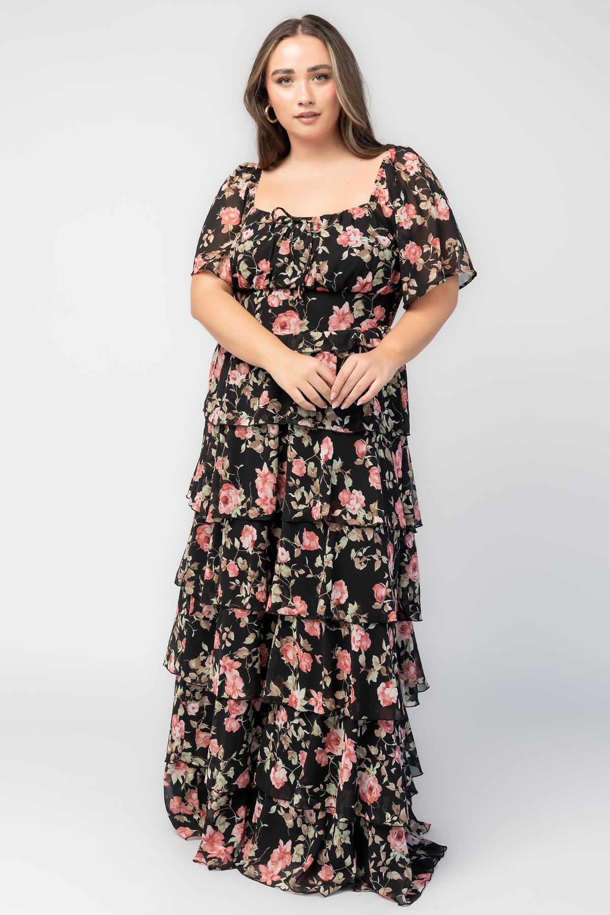 Bliss Tiered Maxi Dress in Black Multi Floral with square neckline, flutter sleeves, smocked back, and tiered maxi skirt.