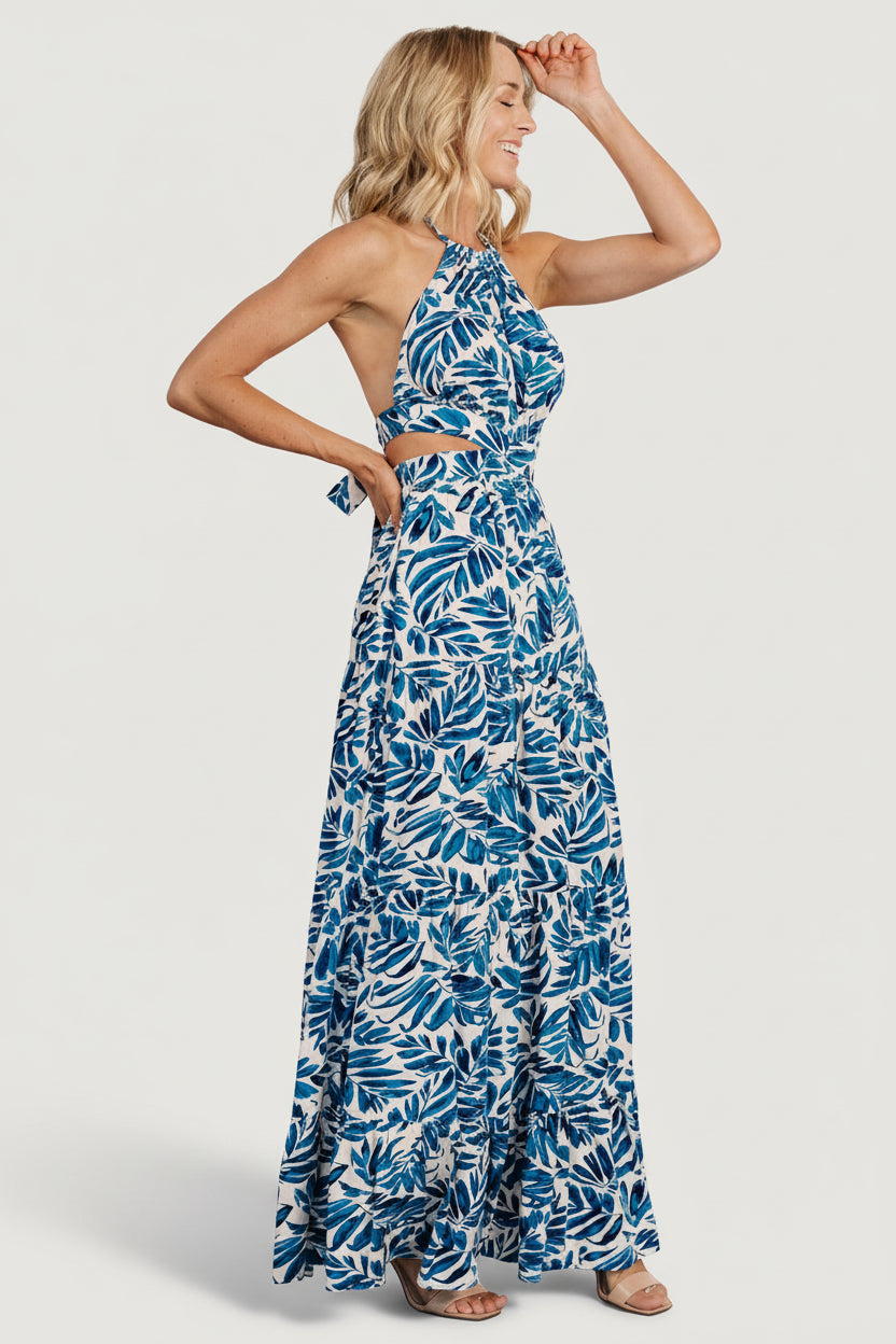 Back view of cobalt print maxi dress emphasizing open back, adjustable ties, and elasticized back waist for a comfortable fit.