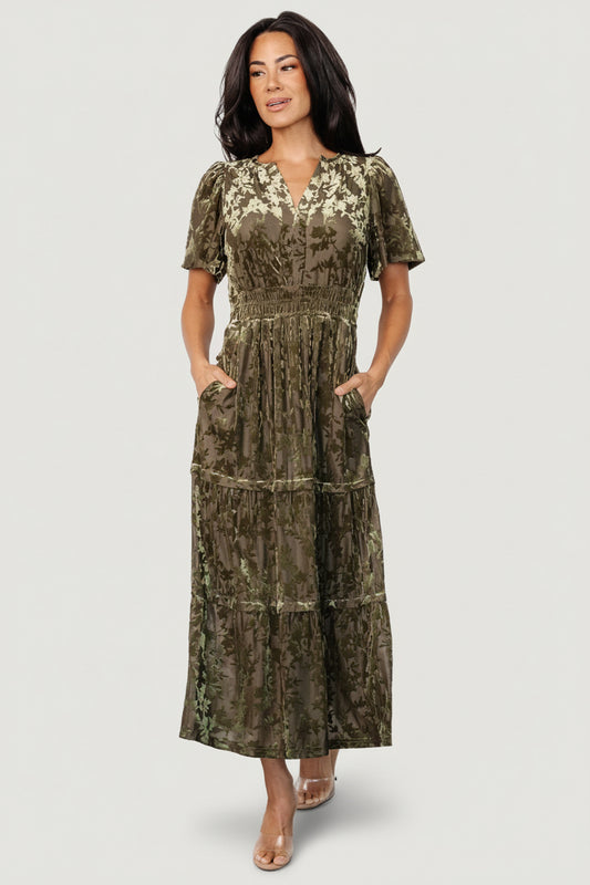 Front view of an olive burnout velvet midi dress with a notched V-neckline, flutter sleeves, smocked waist and flattering drape.