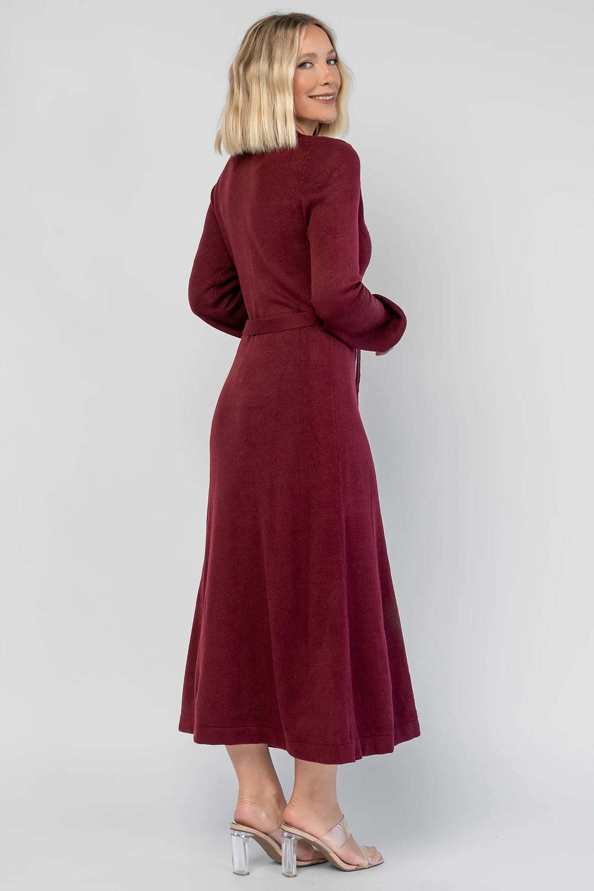 Camilla Sweater Dress in Wine with a knit button-down bodice, removable waist belt, and a flowing lined skirt.