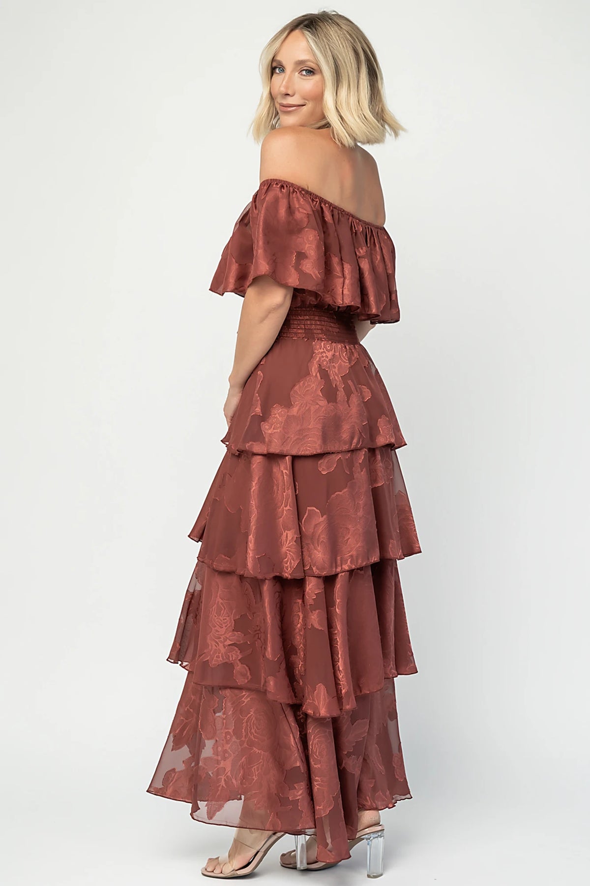 Carina Off Shoulder Maxi Dress in Marsala with ruffle neckline, smocked waist, and four-tiered chiffon skirt.