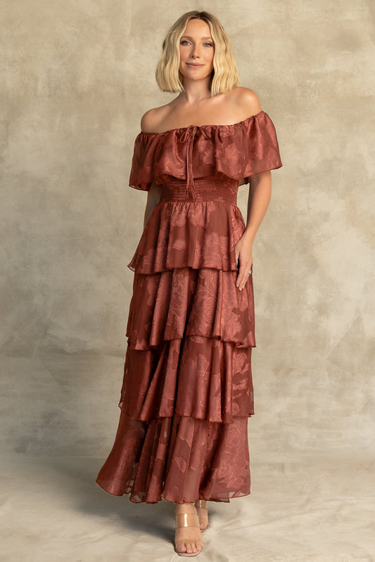 Carina Off Shoulder Maxi Dress in Marsala with ruffle neckline, smocked waist, and four-tiered chiffon skirt.