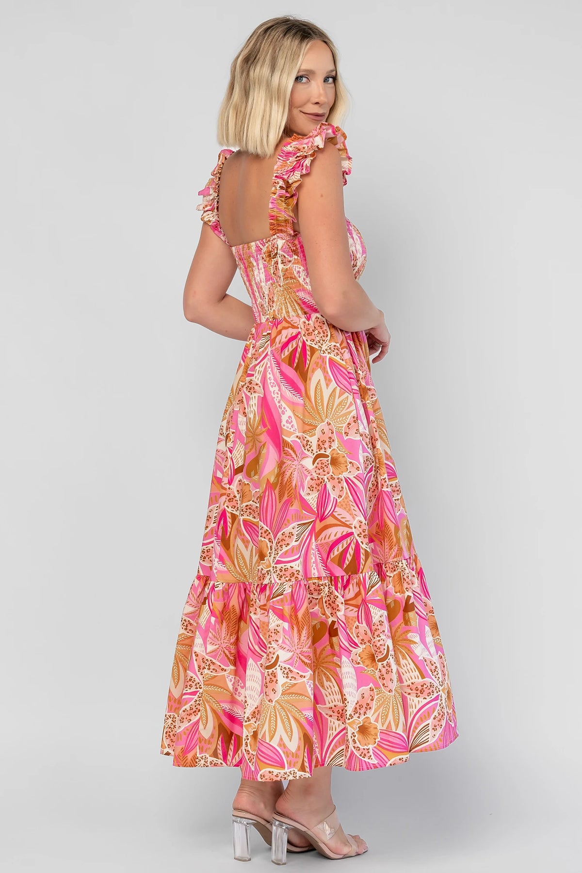 Carla Smocked Dress in Pink Multi with a smocked bodice, square neckline, ruffle straps, and a flowy midi skirt.