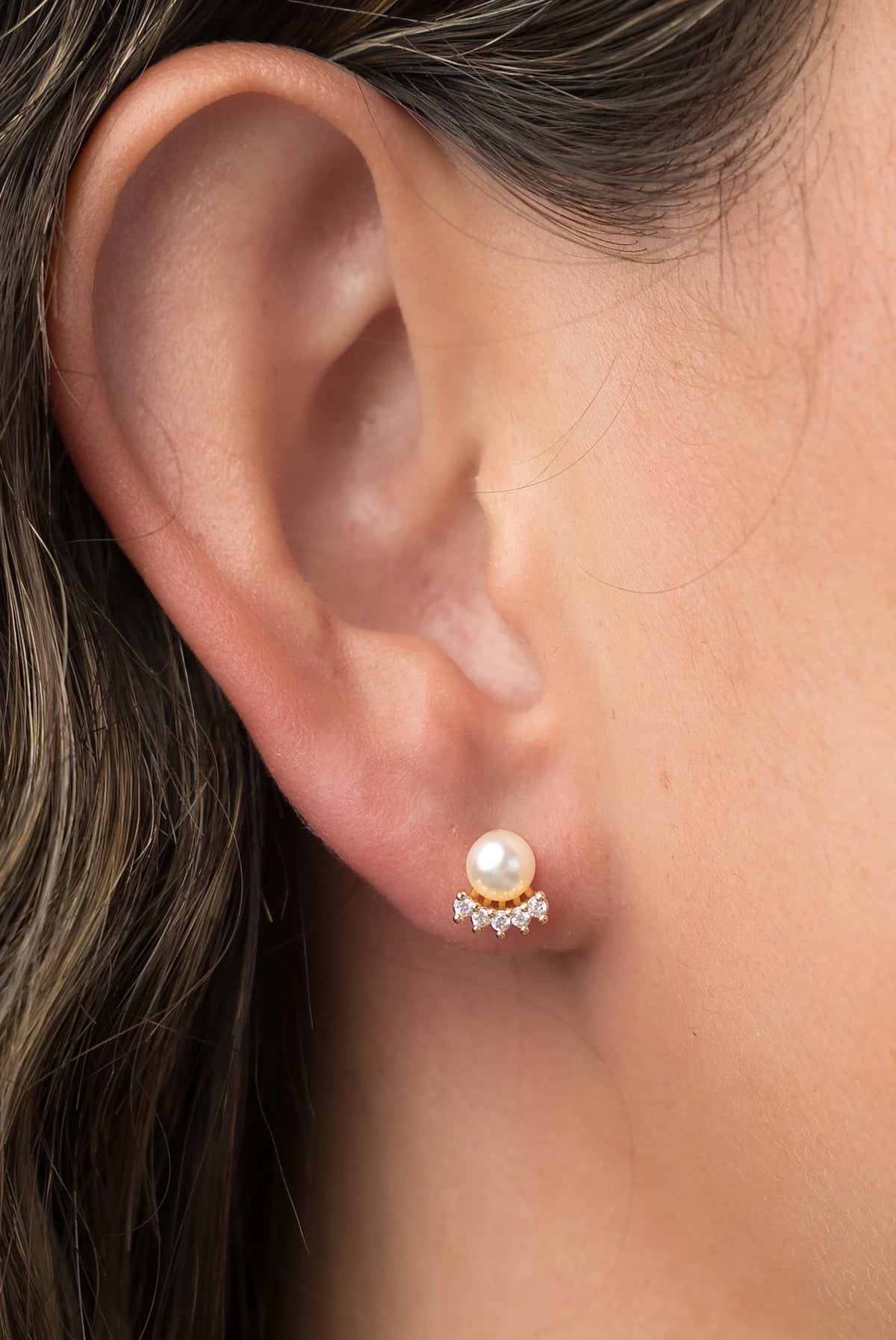 Carol Pearl Crown Stud Earrings in Gold with crown-inspired cubic zirconia and faux pearl.