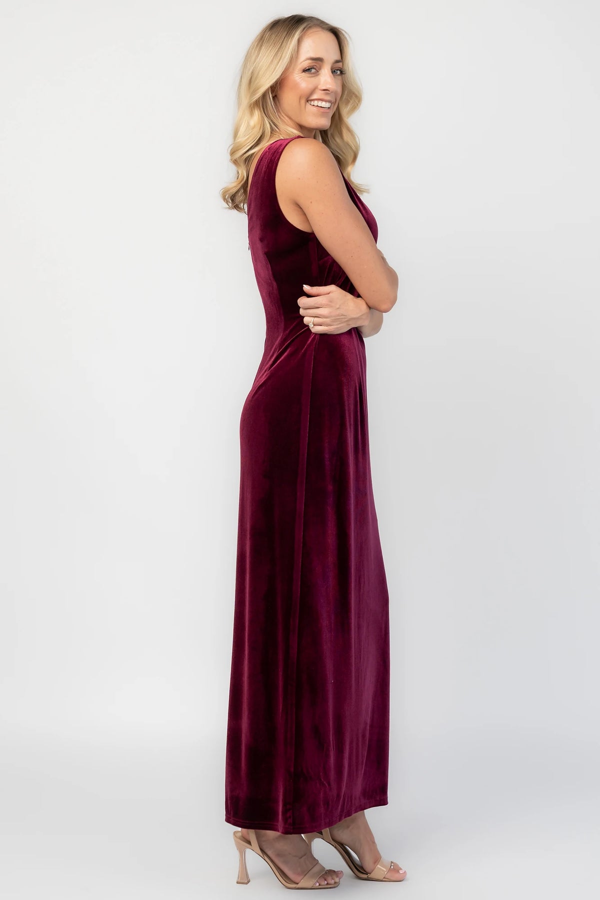 Charley Velvet Maxi Dress in Wine with an elegant boat neckline, sleeveless design, and a figure-skimming column silhouette.