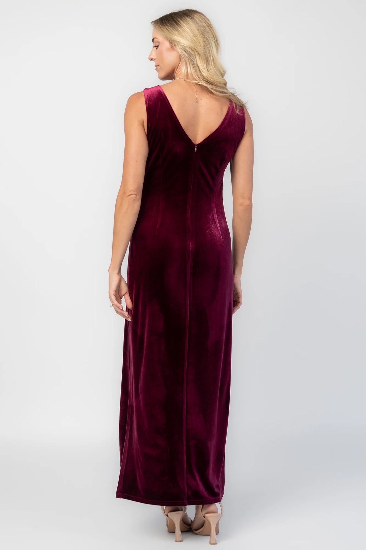 Charley Velvet Maxi Dress in Wine with an elegant boat neckline, sleeveless design, and a figure-skimming column silhouette.