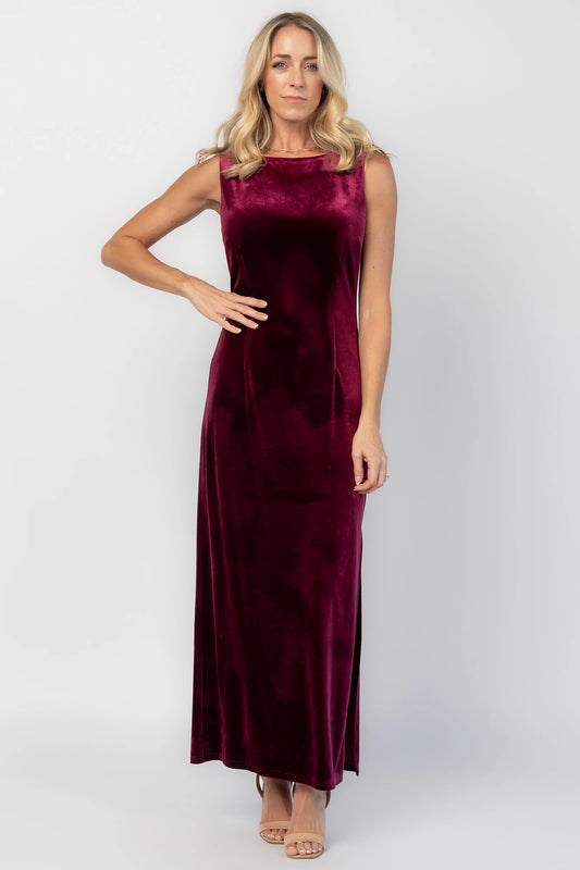 Charley Velvet Maxi Dress in Wine with an elegant boat neckline, sleeveless design, and a figure-skimming column silhouette.