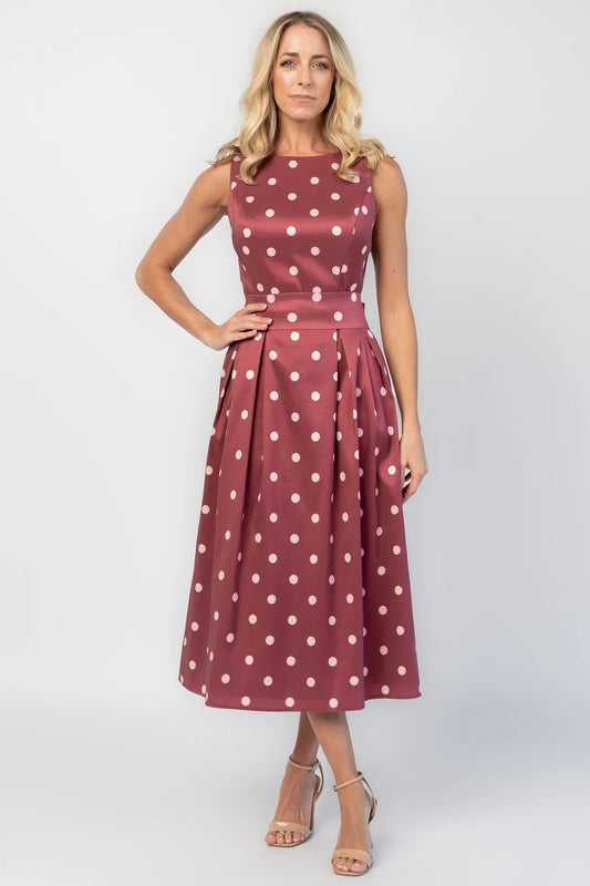 Chiara Midi Dress in Wine + Pink Dot with a boat neckline, pleated full skirt, and a fitted sleeveless bodice.