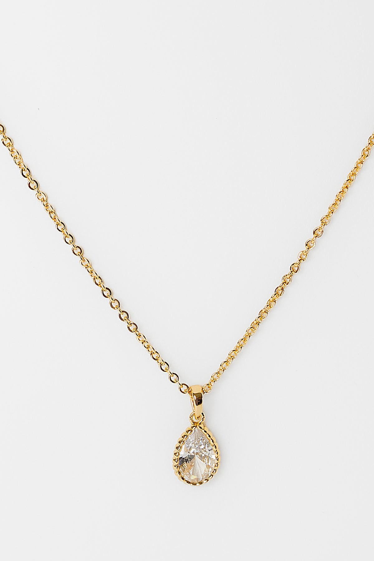 Christy Teardrop Pendant Necklace in Gold with sparkling teardrop-cut cubic zirconia pendant and delicate gold-tone chain.